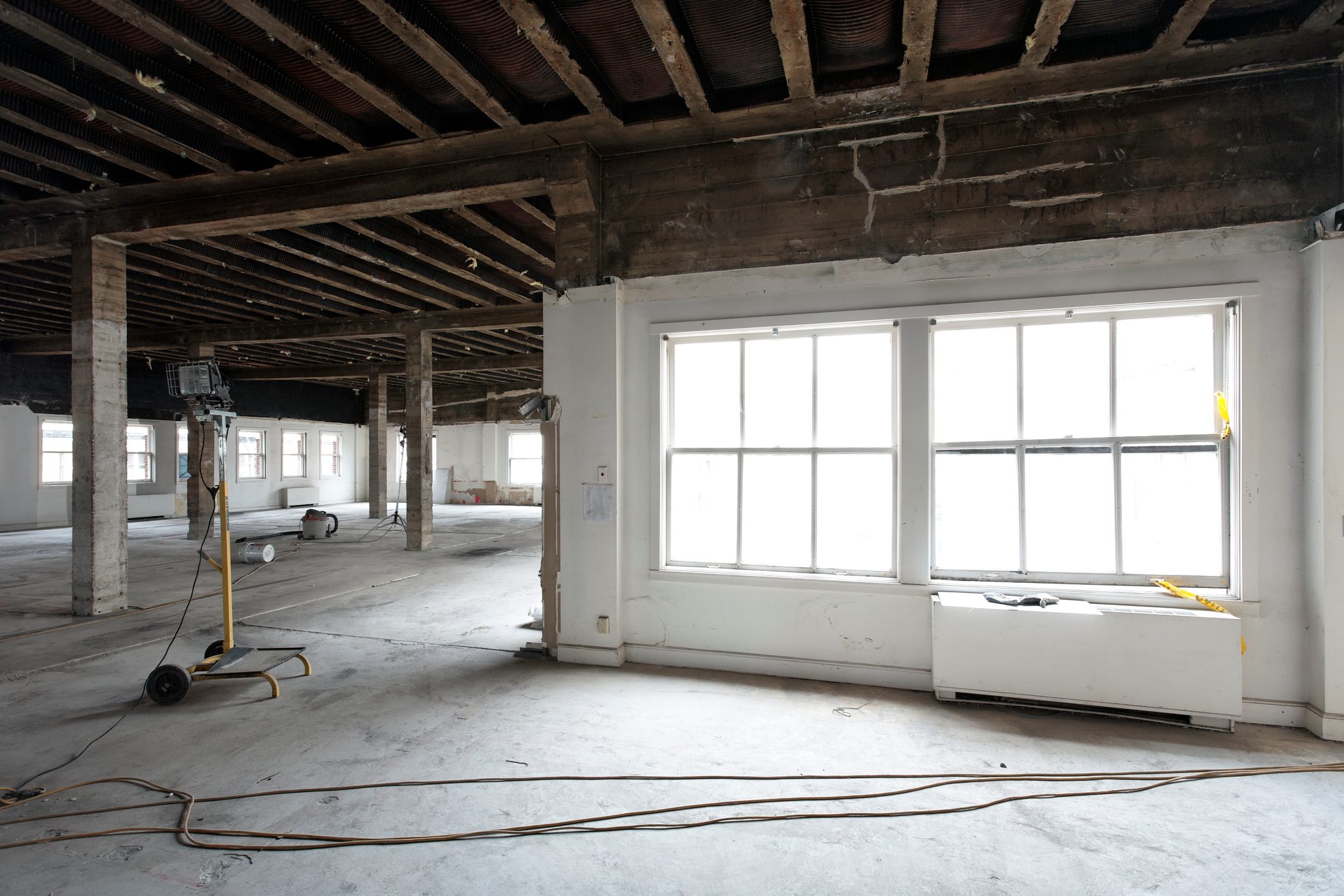 A room with many windows and floors in it